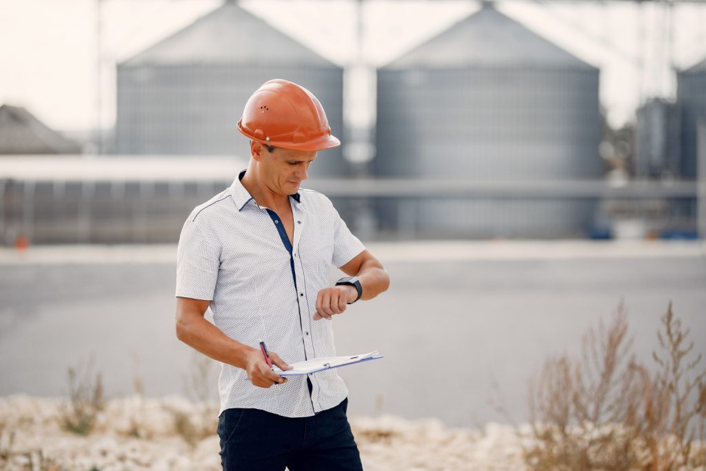 engineer-halmet-standing-by-factory