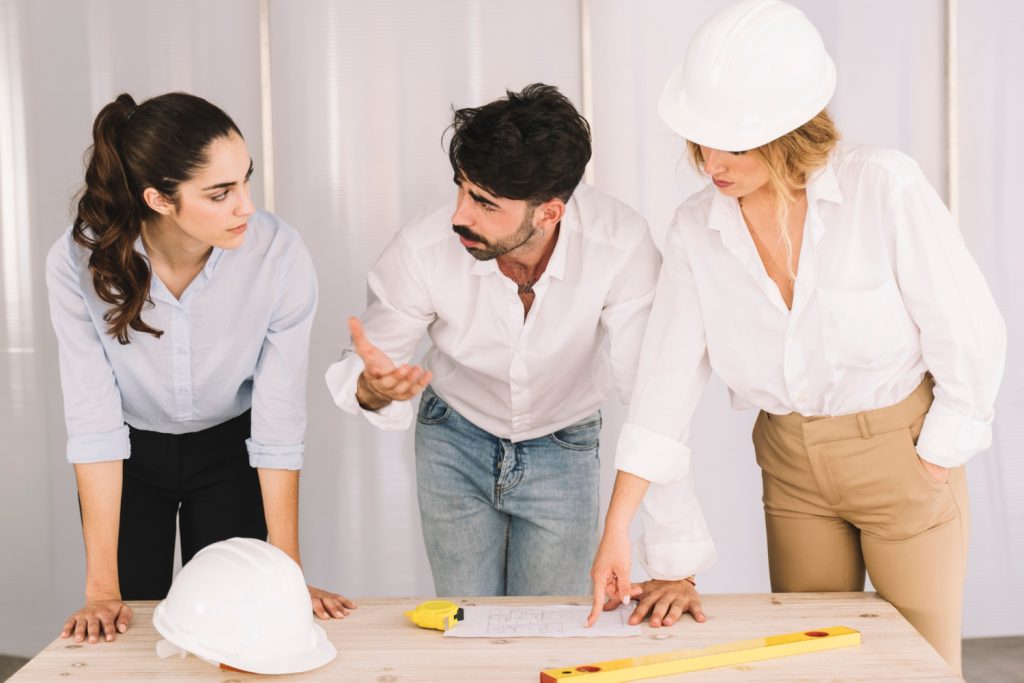 group-engineers-discussing-project